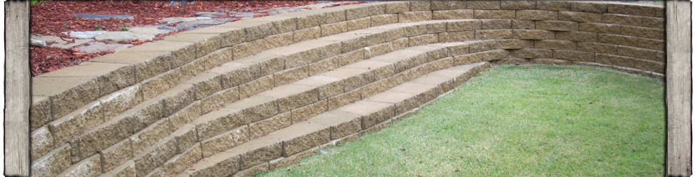 This retaining wall doubles as a set of steps down to the lawn.